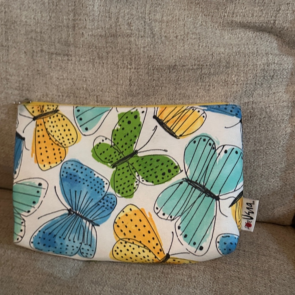 Vera and Clinique collaborated design cosmetic bag in euc -clean interior